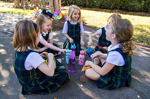 Students enjoying lunch outside.